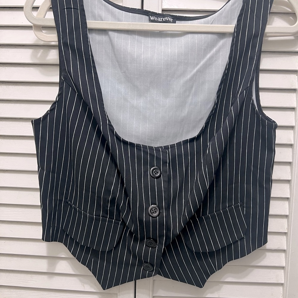 Black and white striped vest 18 inches wide and 18 inches long